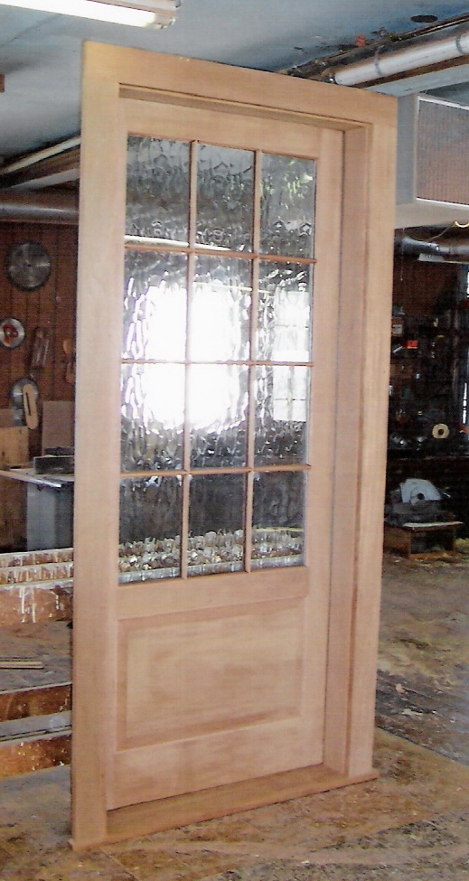 Custom built wood exterior doors; Entryway, Arch top, Reproduction